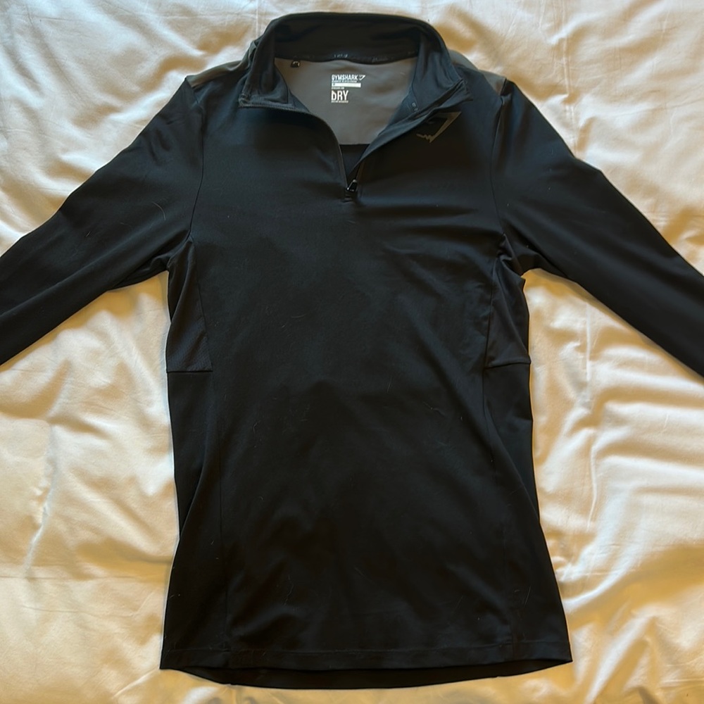 Gymshark 1/4 zip black long sleeve shirt. Size medium.